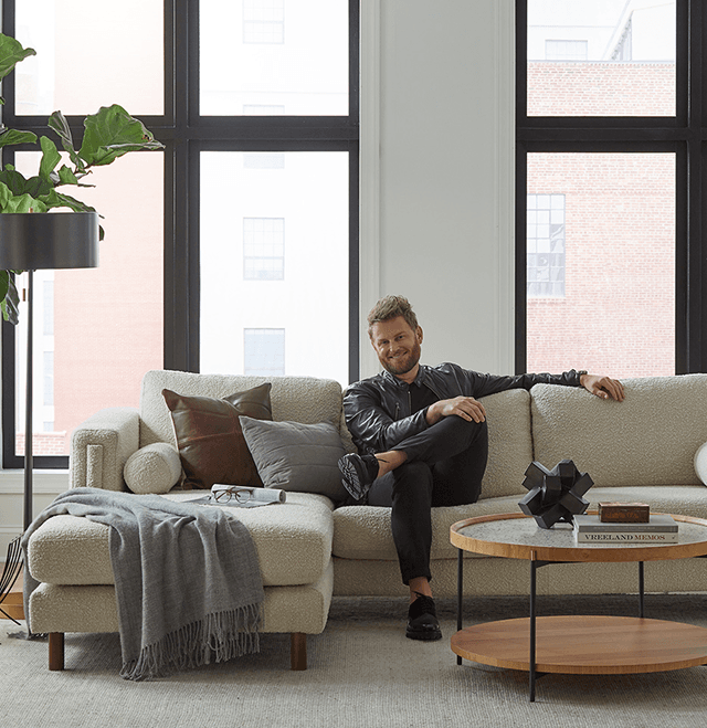 Man relaxing on modern sofa